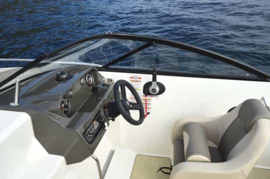 The cockpit of a Bayliner VR5 Cuddy Boat For Sale UK at Bates Wharf Marine Sales