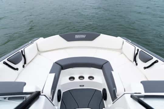 The rear view of the Bayliner Heyday WT-2DC Wakeboard Boat For Sale at Bates Wharf