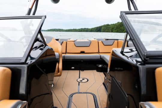 The cockpit of the Bayliner Heyday WT-2DC Wakeboard Boat For Sale at Bates Wharf