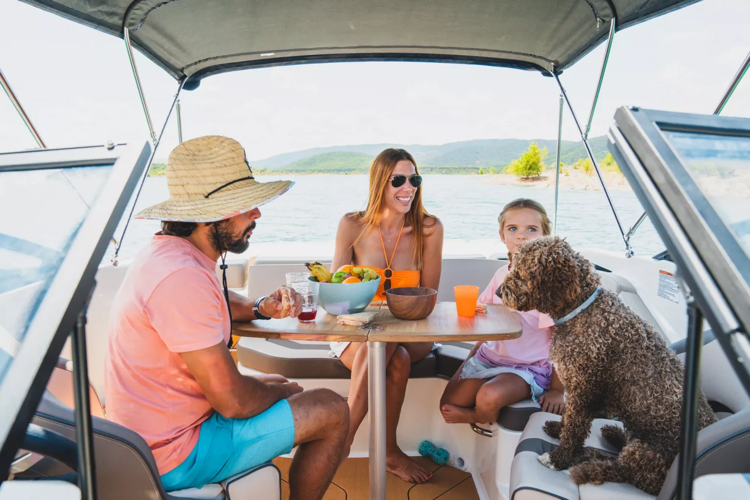A family enjoying a Bayliner V20 Boat For Sale UK at Bates Wharf